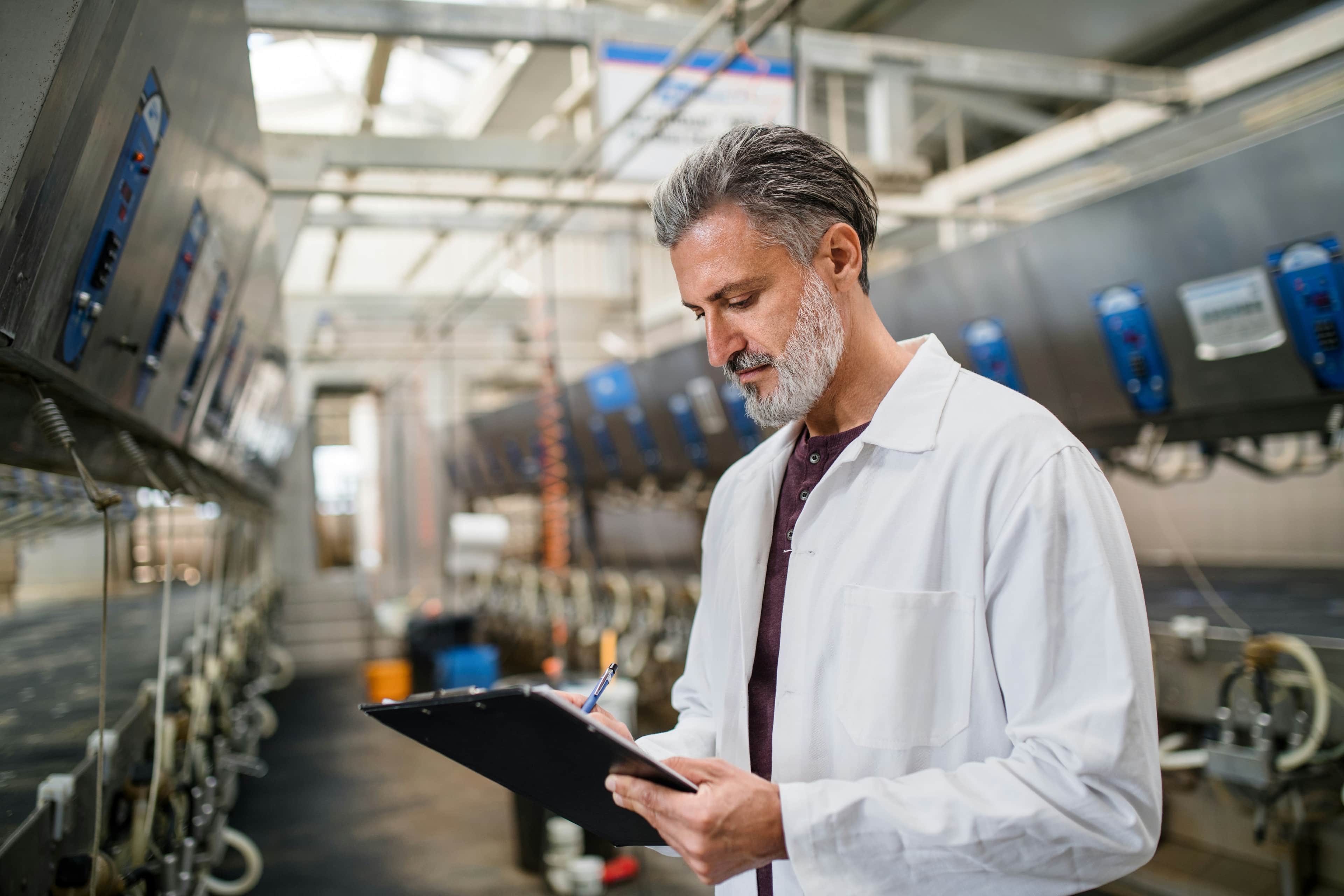 Laboratory quality specialist reviewing process controls