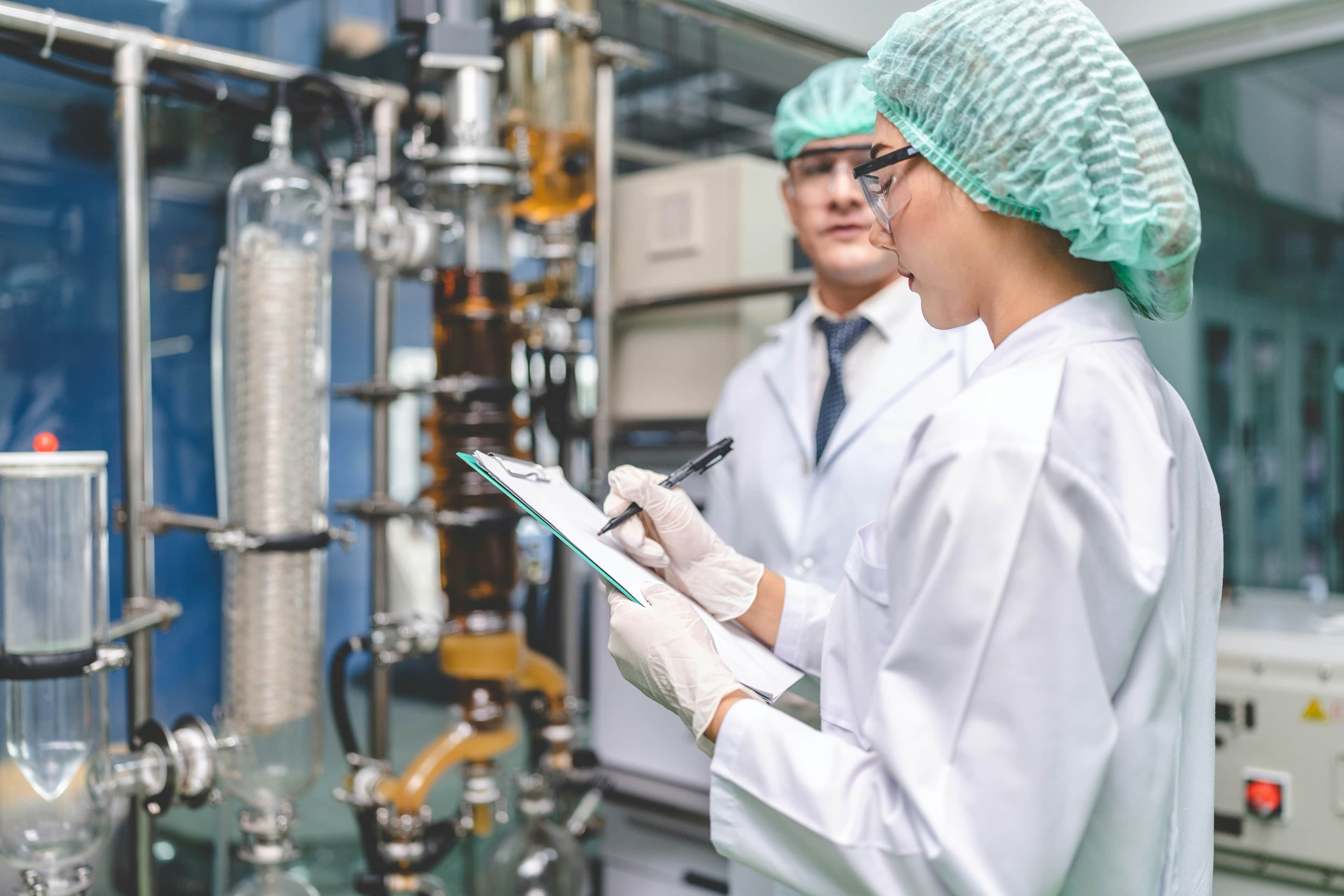 Laboratory quality specialist reviewing process controls