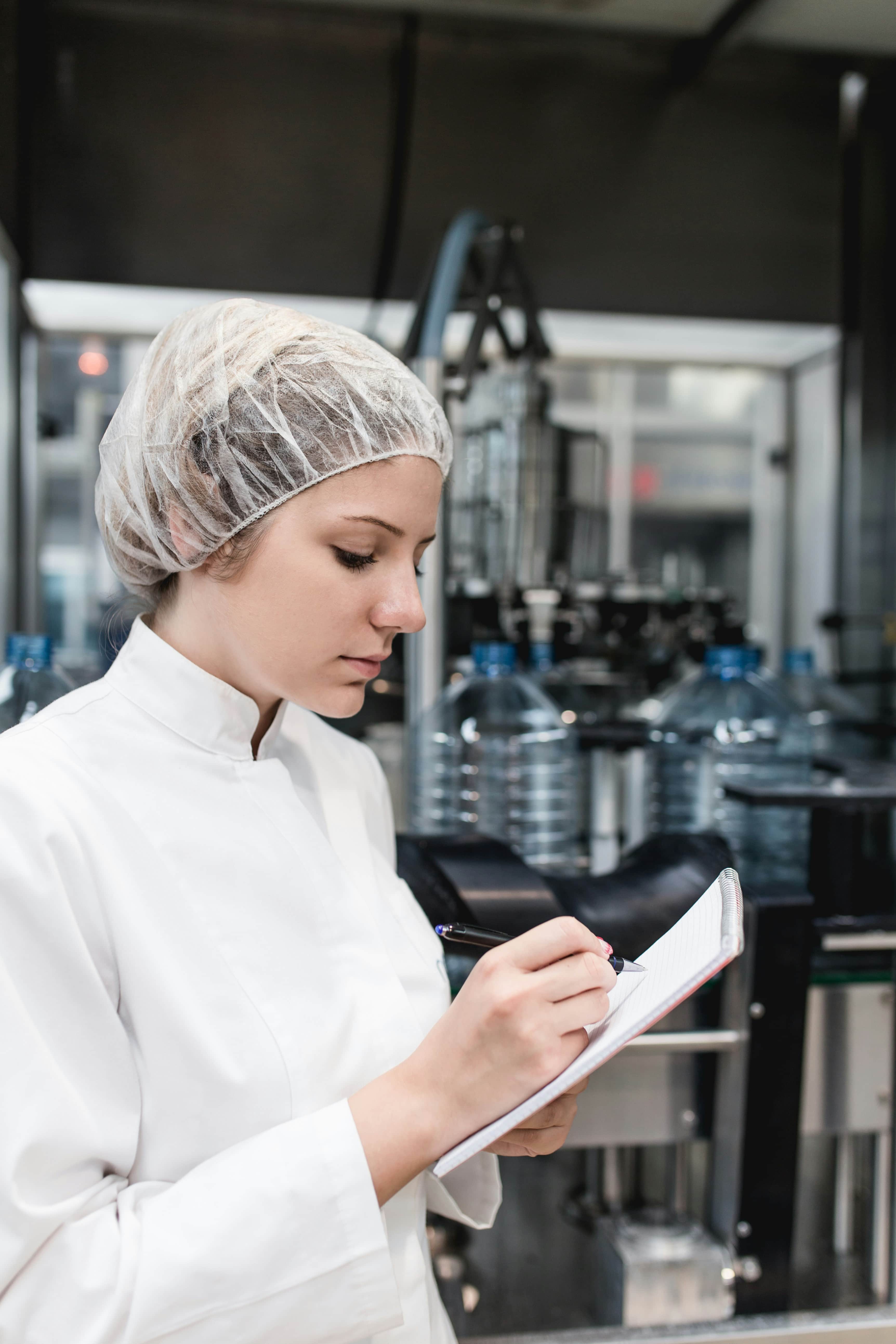 Laboratory quality specialist reviewing process controls